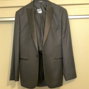 Brand new Express Black Tuxedo. Jacket is a 38R. The pants are 32 x 32.